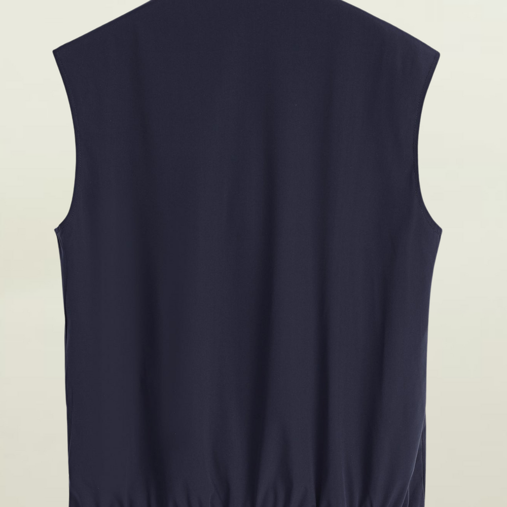 
                      
                        Gilet réversible
                      
                    