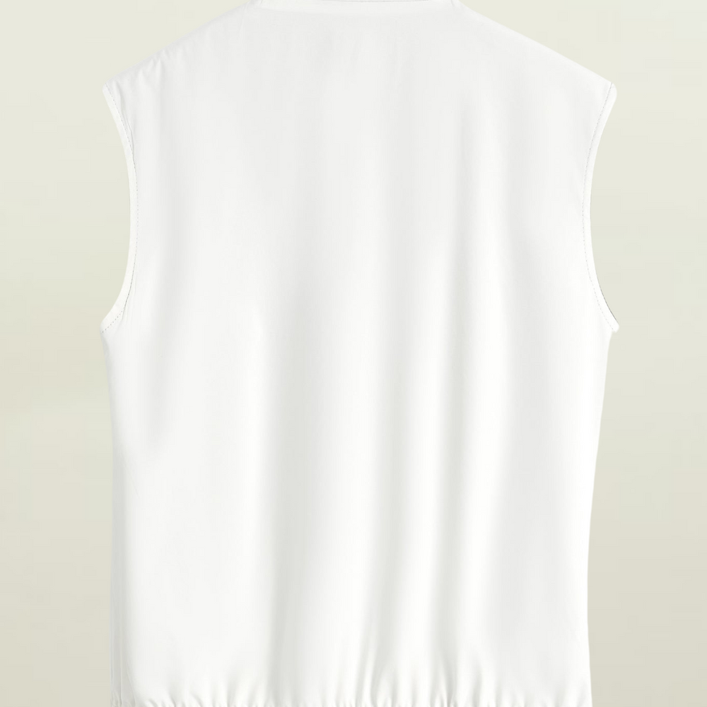 
                      
                        Gilet réversible
                      
                    