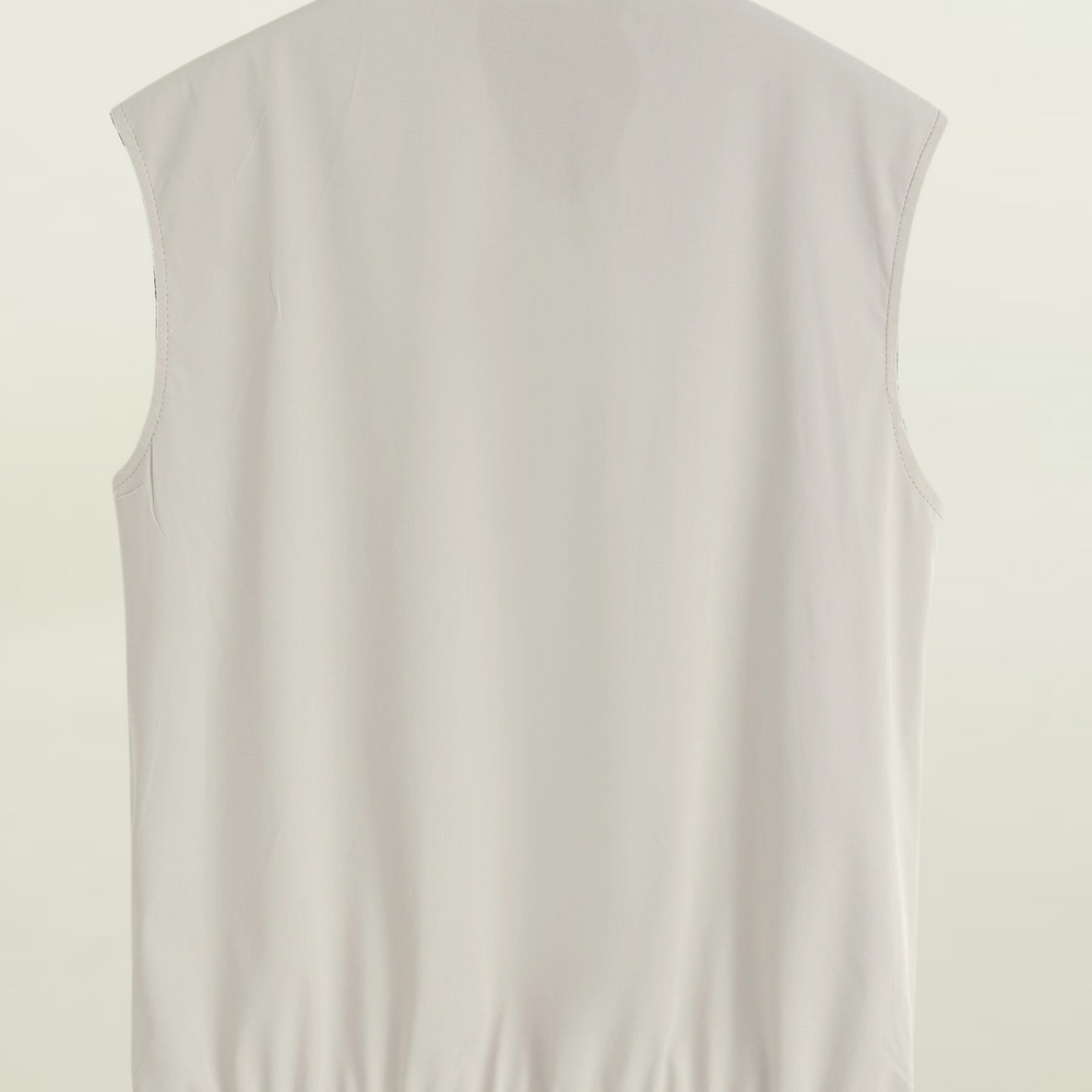 
                      
                        Gilet réversible
                      
                    