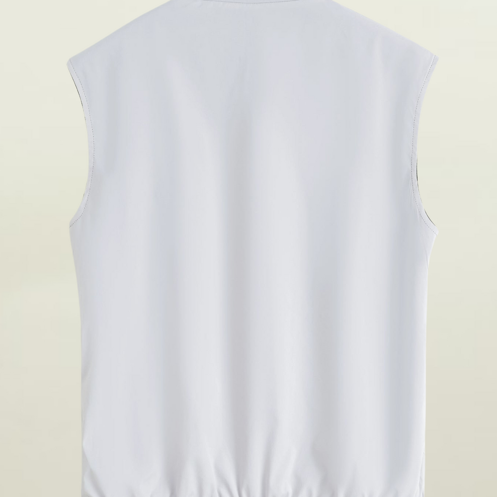 
                      
                        Gilet réversible
                      
                    