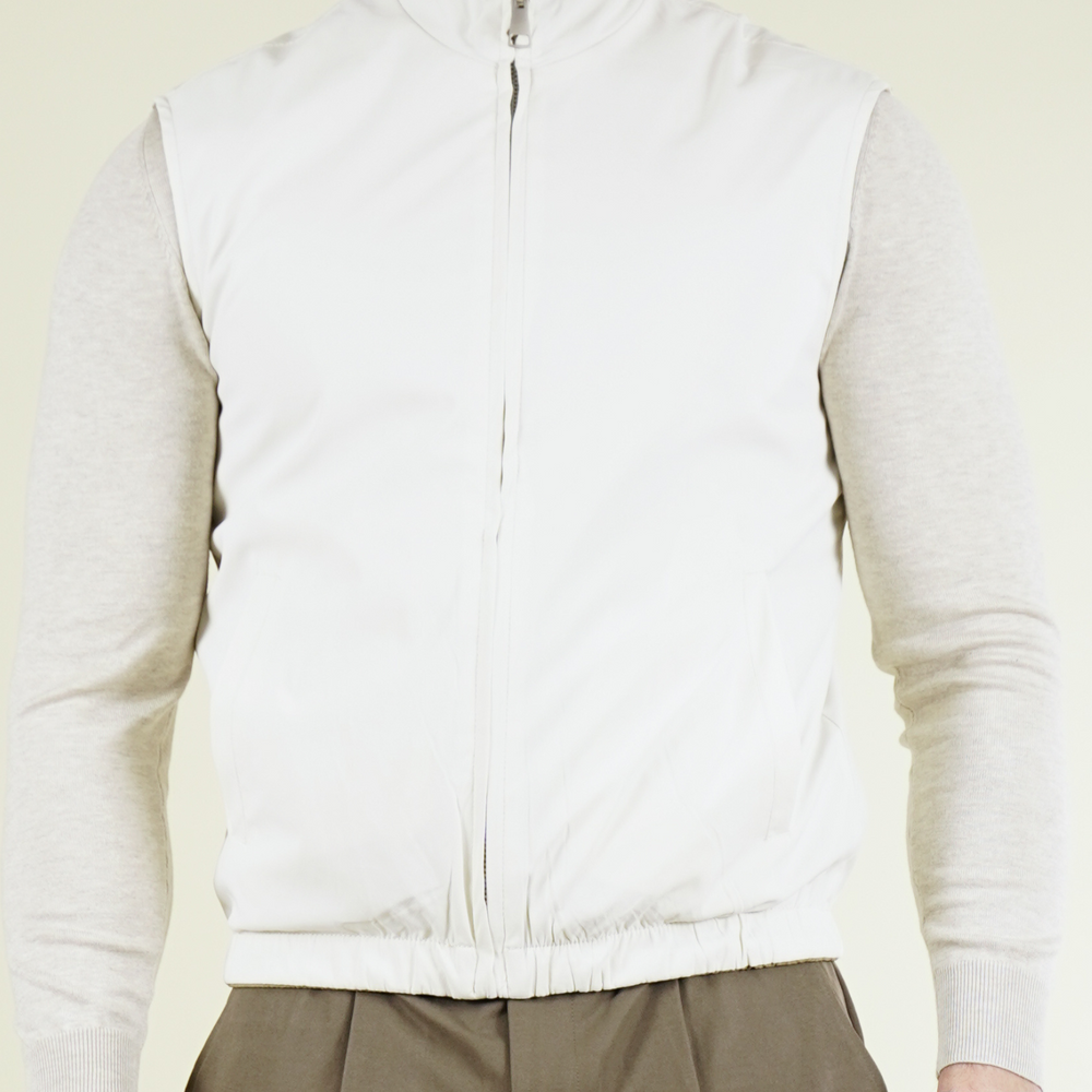 
                      
                        Gilet réversible
                      
                    