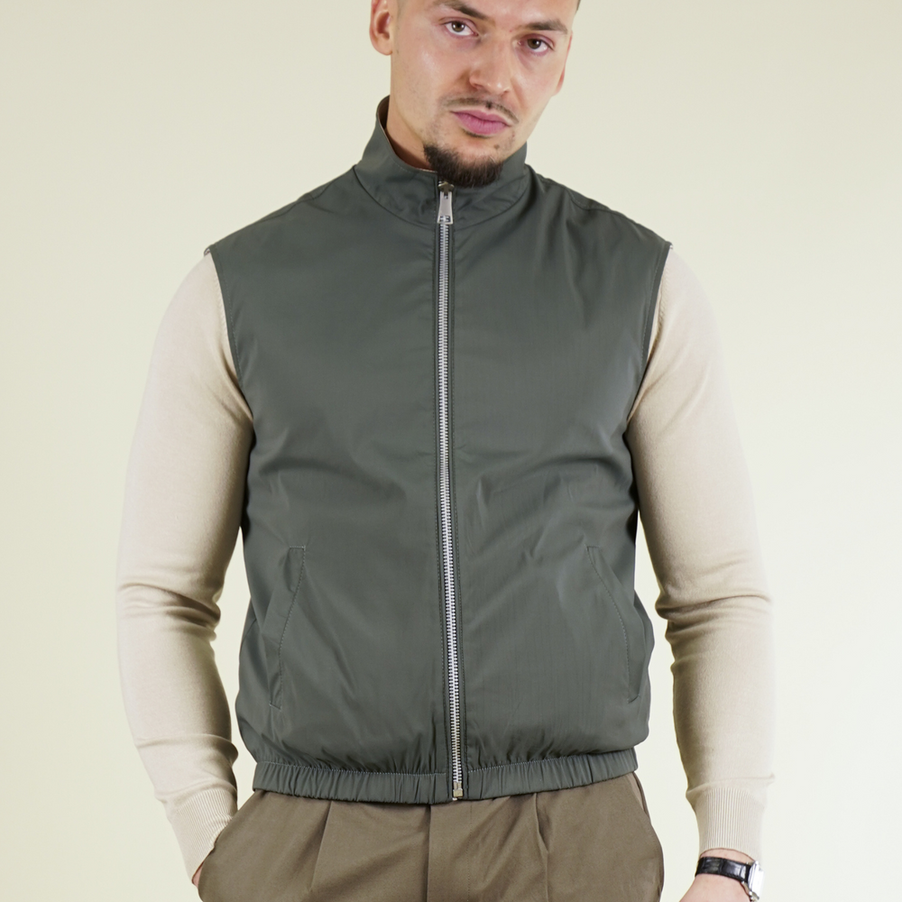 
                      
                        Gilet réversible
                      
                    
